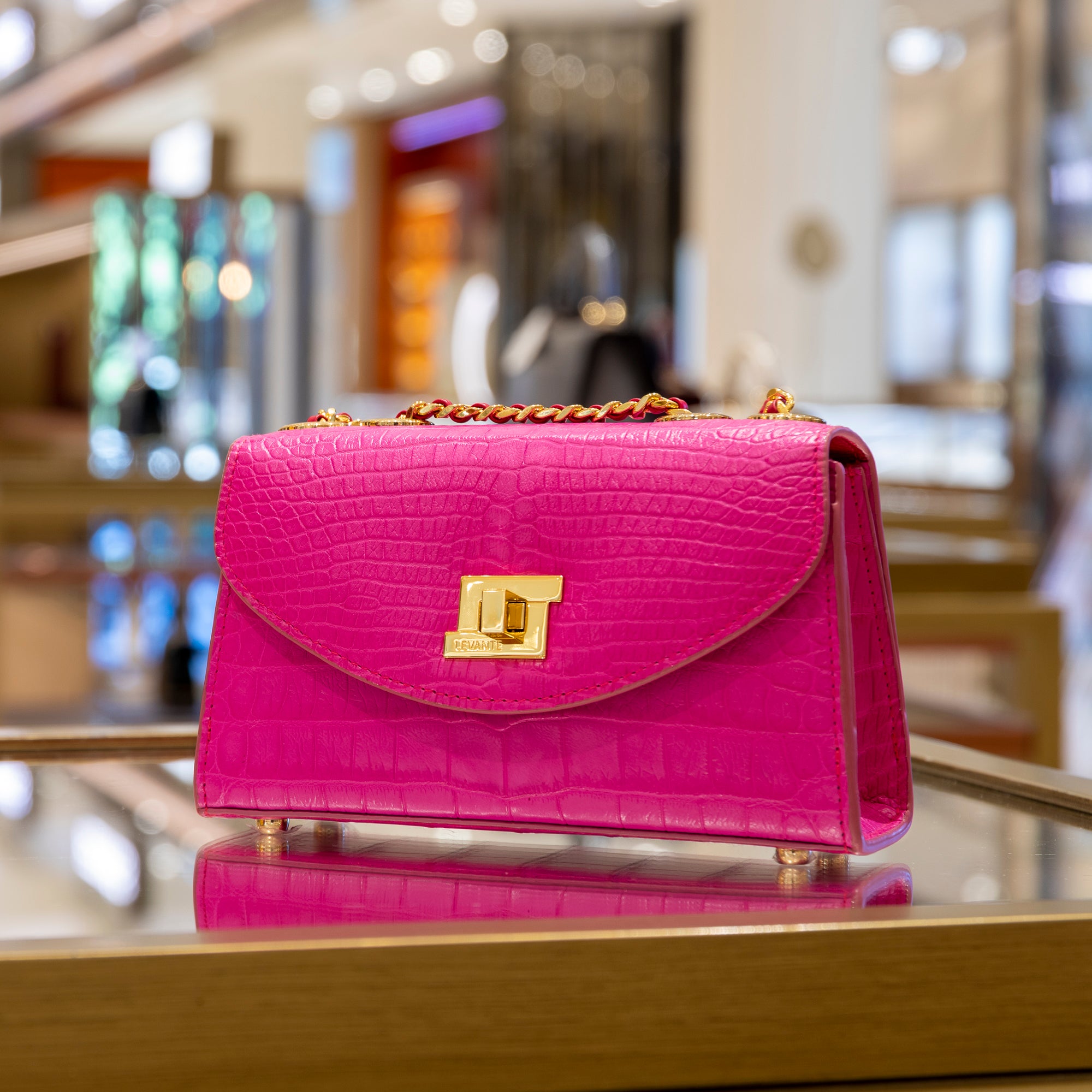 Bright pink store clutch